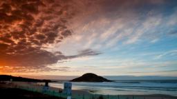Sunrise over the contest site at Praia Vila