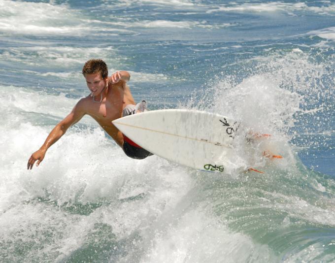 surfer at Deerfield Pier
