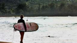 Surfer with longboard