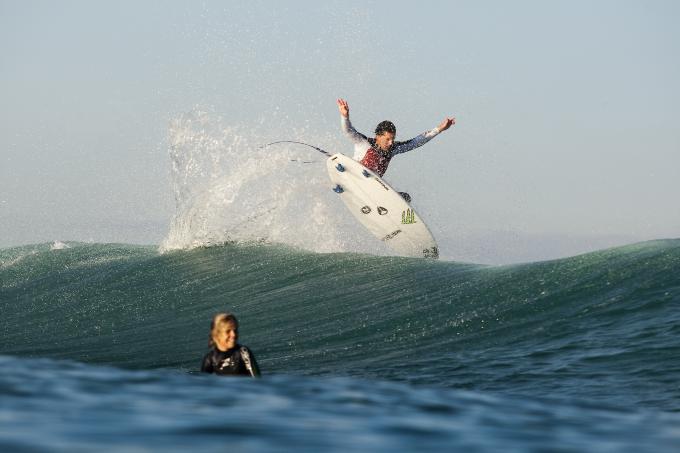 Andy Irons behind the wave
