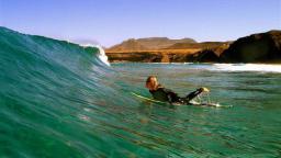 Surfer Girl of Nalusurf Surfschool Fuerteventura