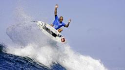 Kelly Slater boosting air at Lower Trestles