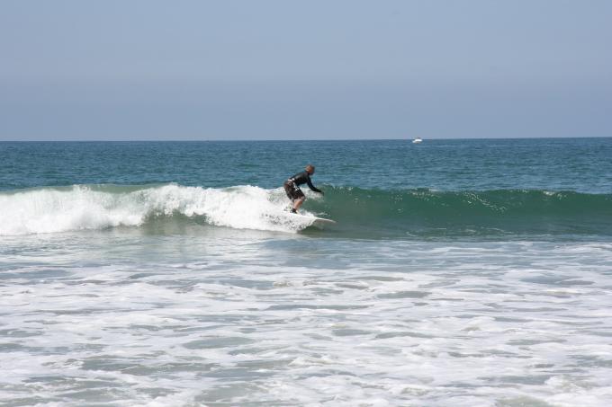 Me surfing 2008 on a 9' thin (2 3/4