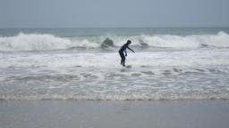 Beth surfing