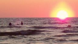 Great Lakes surfers Sunset