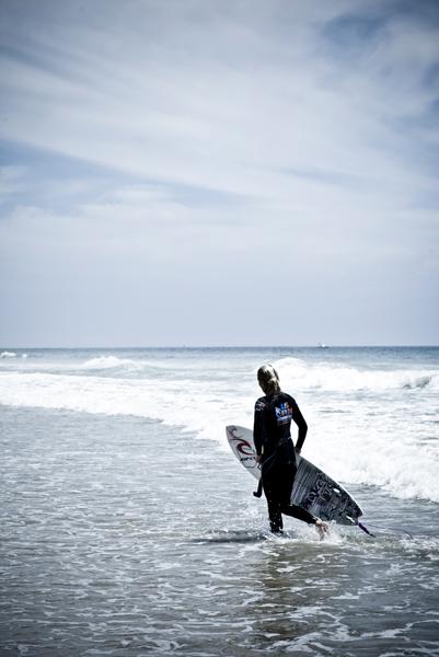 Stephanie Gilmore in the shorebreak
