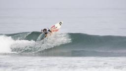 Rebecca Woods surfing in small waves
