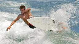 surfer at Deerfield Pier