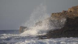 Waves breaking hard  at Praia das Macas