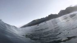 Asing Rides Teahupo'o At Dusk