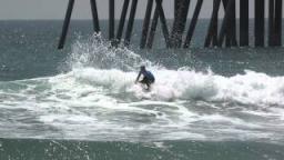 John John surfing around Orange County