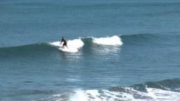 Surfing Port Waikato, New Zealand - 26 February 2013 