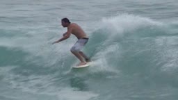 Surfing at Macumba Beach