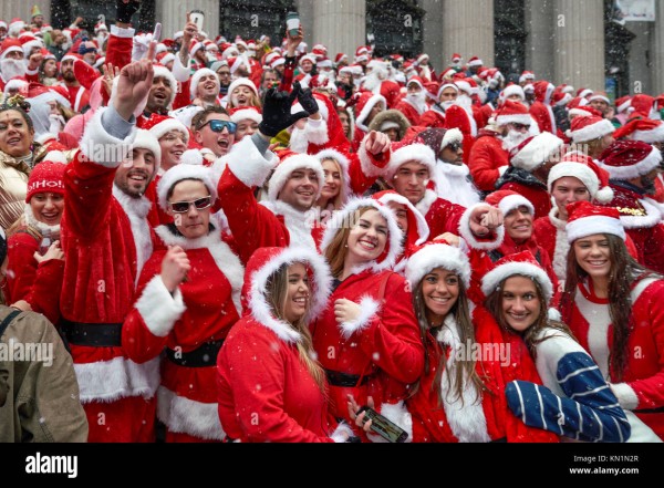 new-york-usa-9-dec-2017-people-dressed-as-santa-claus-pose-for-a-group-KN1N2R.jpg