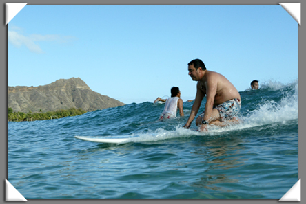 Drew%20on%20knees%20on%20surfboard.jpg