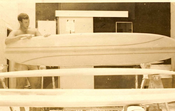 91 BW Man shaping longboard.jpg