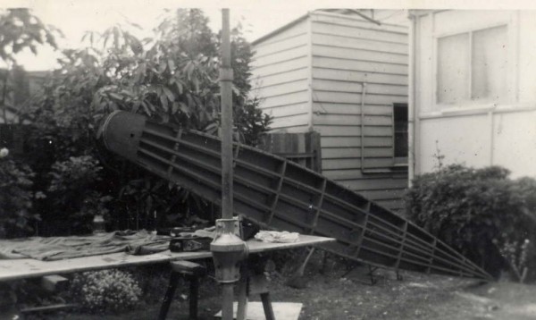 56 BW Wooden surfski frame in backyard.jpg
